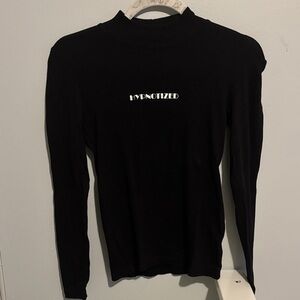 Black Long Sleeve Turtleneck with Hypnotized on the front